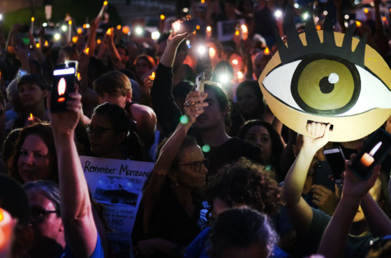 Hundreds of people gather in lower Manhattan for a "Lights for Liberty" protest against migrant detention camps and the impending raids by Immigration and Customs Enforcement (ICE) this coming weekend in various cities on July 12, 2019 in New York City.