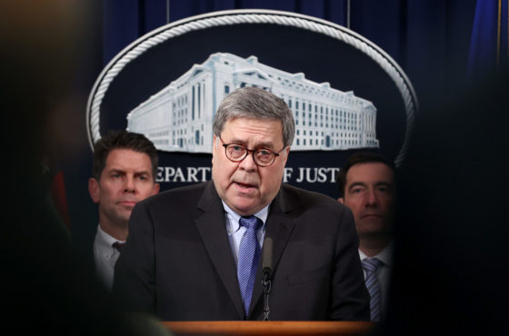 Attorney General William Barr (C) speaks during a press conference on the shooting at the Pensacola naval base January 13, 2020 in Washington, DC.
