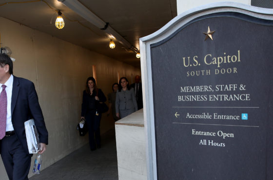 Michael Atkinson leaves the U.S. Capitol south door.