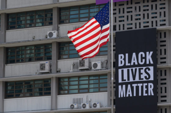 A 'Black Lives Matter' banner is displayed on the US embassy in Seoul on June 14, 2020.