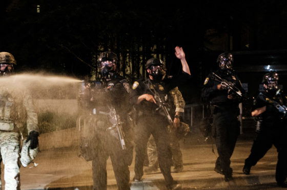 Federal officers use tear gas and other crowd dispersal munitions on protesters outside the Multnomah County Justice Center on July 17, 2020 in Portland, Oregon.
