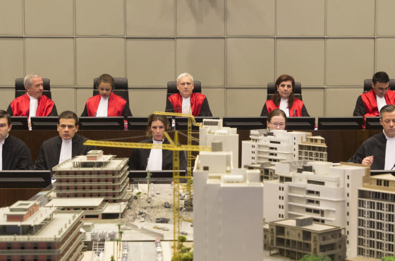 Judges Walid Akoum, Janet Nosworthy, David Re, Micheline Braidy and Nicola Lettier preside over the first hearing in the trial of four people accused of murdering former Lebanese premier Rafiq Hariri at the Special Tribunal for Lebanon in The Hague on January 16, 2014.