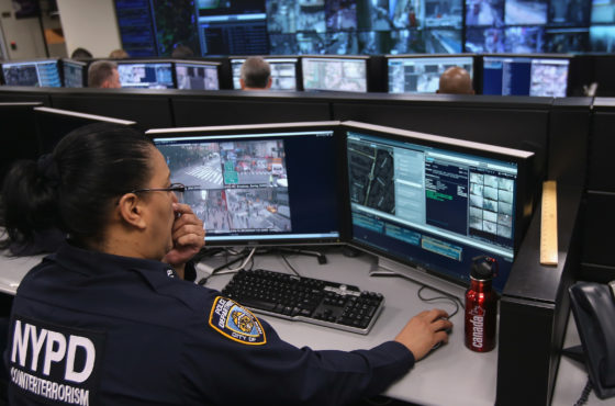 Police and private security personel monitor security cameras at the Lower Manhattan Security Initiative on April 23, 2013 in New York City.