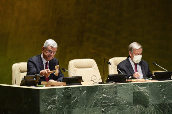 Volkan Bozkir, President of the seventy-fifth session of the United Nations General Assembly, does not wear a face mask while opening the seventy-fifth session of the General Assembly. To his right and somewhat socially distanced is Secretary-General António Guterres, who wears a face mask.