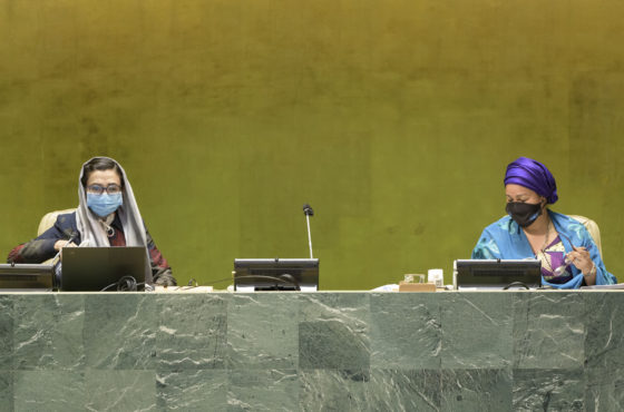 Adela Raz, Vice-President of the 75th session of the General Assembly and Permanent Representative of the Islamic Republic of Afghanistan to the United Nations, chairs the general debate of the General Assembly's seventy-fifth session. Sitting at an appropriate socially distanced space is Deputy Secretary-General Amina Mohammed. Both wear face masks.