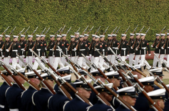 Soldiers from the United States Army, Air Force, Navy, Marines and Coast Guard march in parade during the National POW/MIA Recognition observance ceremony September 16, 2005 on the River Parade Field at the Pentagon in Arlington, Virginia.