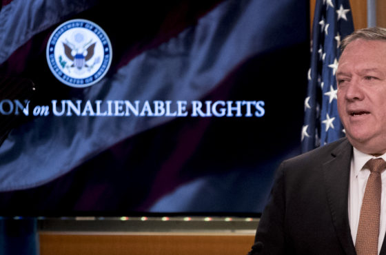 A monitor displays the words Commission on Unalienable Rights behind Secretary of State Mike Pompeo as he speaks without a face mask during a news conference at the State Department in Washington,DC on July 15, 2020.