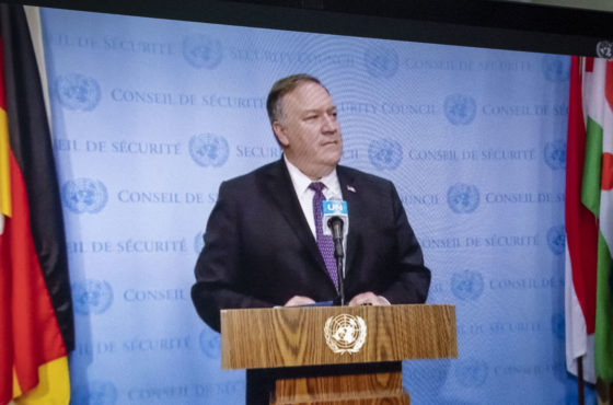 Pompeo on a computer screen giving a press conference.