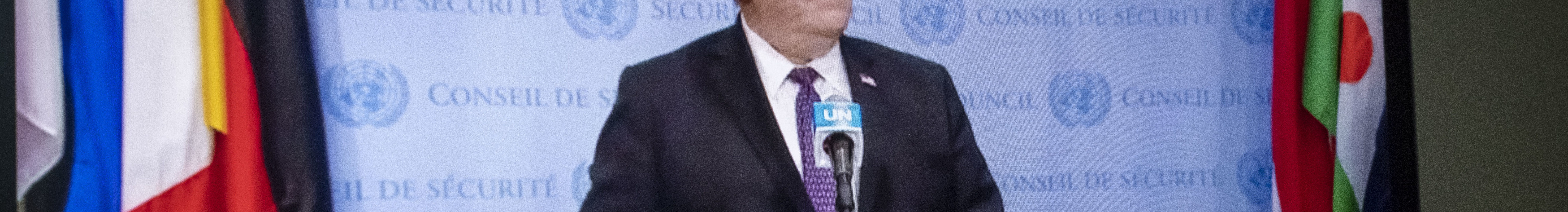 Pompeo on a computer screen giving a press conference.