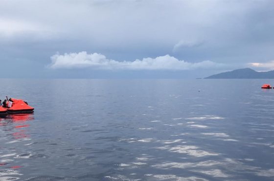 Asylum seekers in life rafts on the Aegean Sea