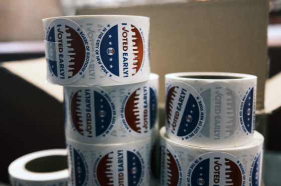 'I voted early' stickers sit on a table at the Brooklyn Armory during early voting on October 28, 2020 in New York City.