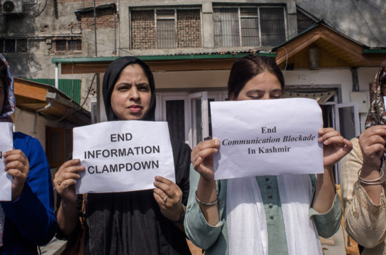 Kashmiri women journalists hold placards as they protest against the continued communication blockade by the Indian authorities after the revocation of special status of Kashmir on October 3, 2019 in Srinagar, the summer capital of Indian administered Kashmir, India. Signs read, “End communication blockade,” “End information clampdown,” “End communication blockade in Kashmir,” and “Communication blockade 60 days and counting…”
