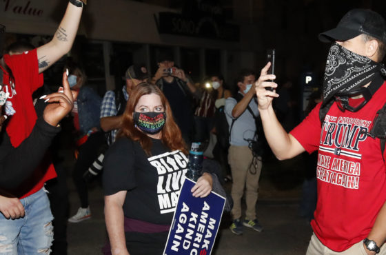 Trump supporters and Black Lives Matter protesters confront each other during the vice presidential debate in Salt Lake City, Utah, on October 7, 2020.