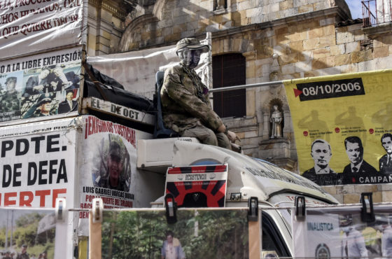 A truck displays posters against the "False Positives in Colombia", extrajudicial executions during the Democratic Security program of the Alvaro Uribe government during a protest on August 06, 2020 in Bogota, Colombia.