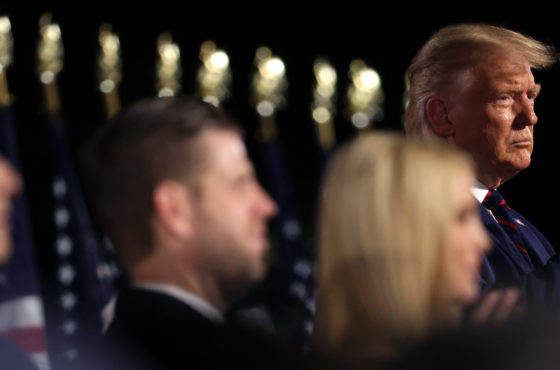 Trump claps his hands at the Republican presidential nomination as son-in-law and senior advisor Jared Kushner and children Eric and Ivanka Trump look on the South Lawn of the White House August 27, 2020 in Washington, DC. None of them wear face masks.