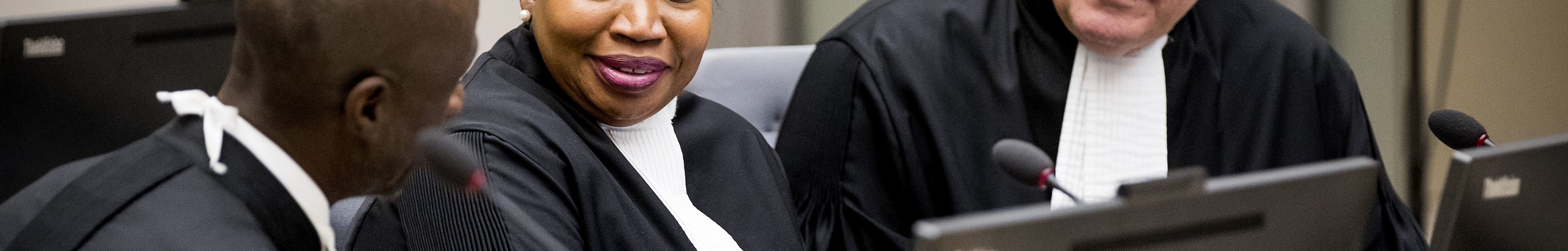 International Criminal Court (ICC) chief prosecutor Fatou Bensouda and deputy prosecutor James Stewart attend the initial appearance before judges of member of the board of the Confederation of African Football (CAF), Patrice-Edouard Ngaissona of the Central African Republic, at the ICC in The Hague on January 25, 2019, following his extradition from France on charges of war crimes and crimes against humanity.
