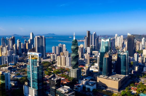 Aerial view of the financial centre of Panama City taken on April 25, 2019. Areas with tress and shorter buildings are nestled between the skyscrapers.