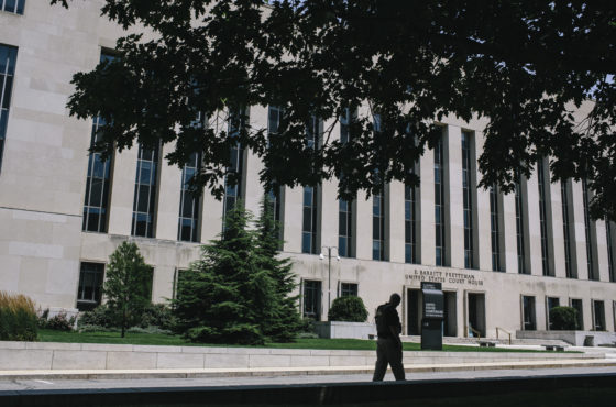 A U.S. Marshal walks outside the E. Barrett Prettyman United States Courthouse in Washington D.C. on Saturday, June 28, 2014.